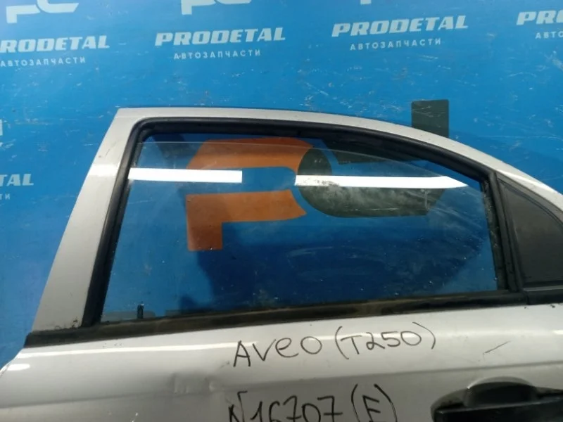 Стекло двери заднее левое Chevrolet Aveo T250