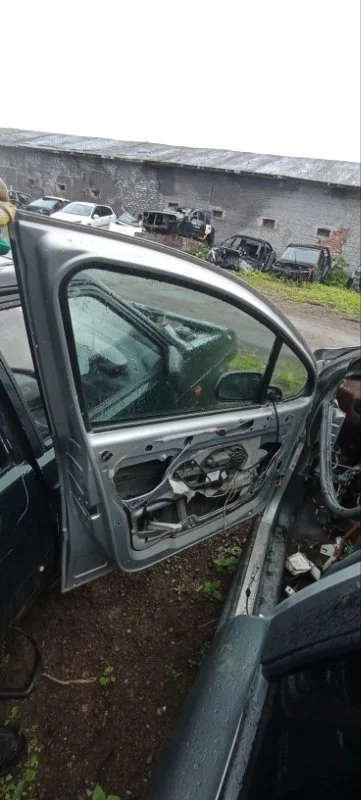 Стеклоподъемник эл. передний левый Peugeot 307