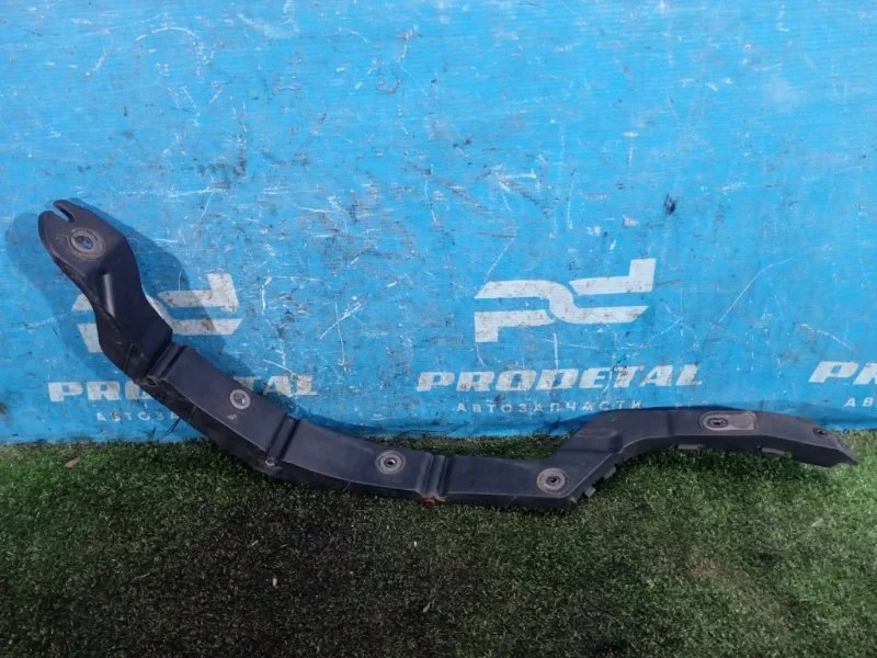 Кронштейн бампера задний правый Opel Astra H