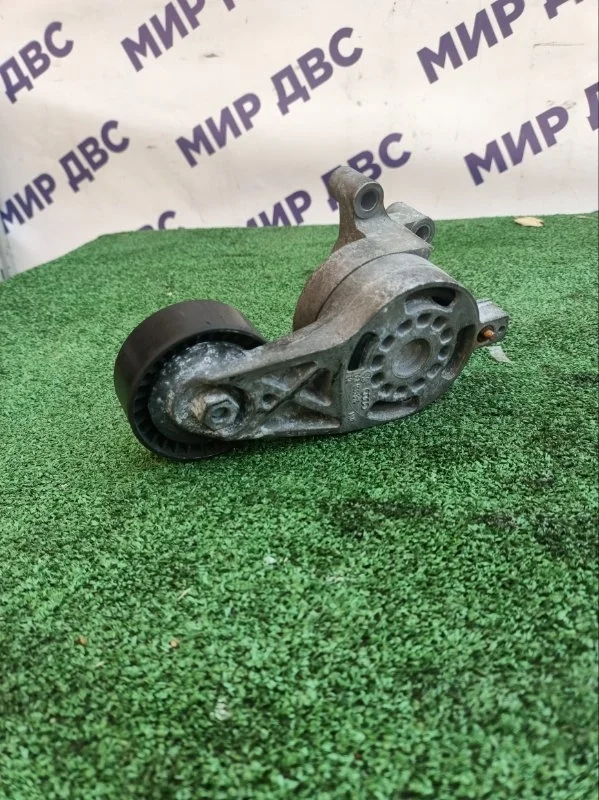 Натяжитель ремня генератора volkswagen Passat B6