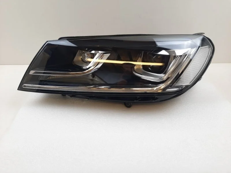 Фара Volkswagen Touareg 2014-2017 7P1941043A NF, левая