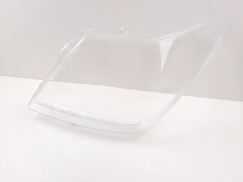 Стекло фары Nissan Patrol 2010- 260601LB1A U62, левое