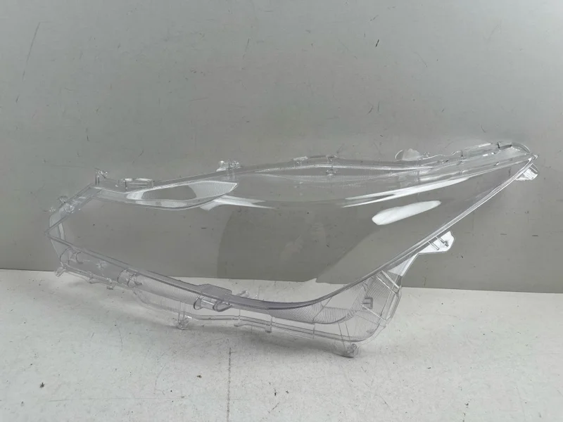 Стекло фары Toyota Corolla 2019-2021 8113002T31 E210, левое