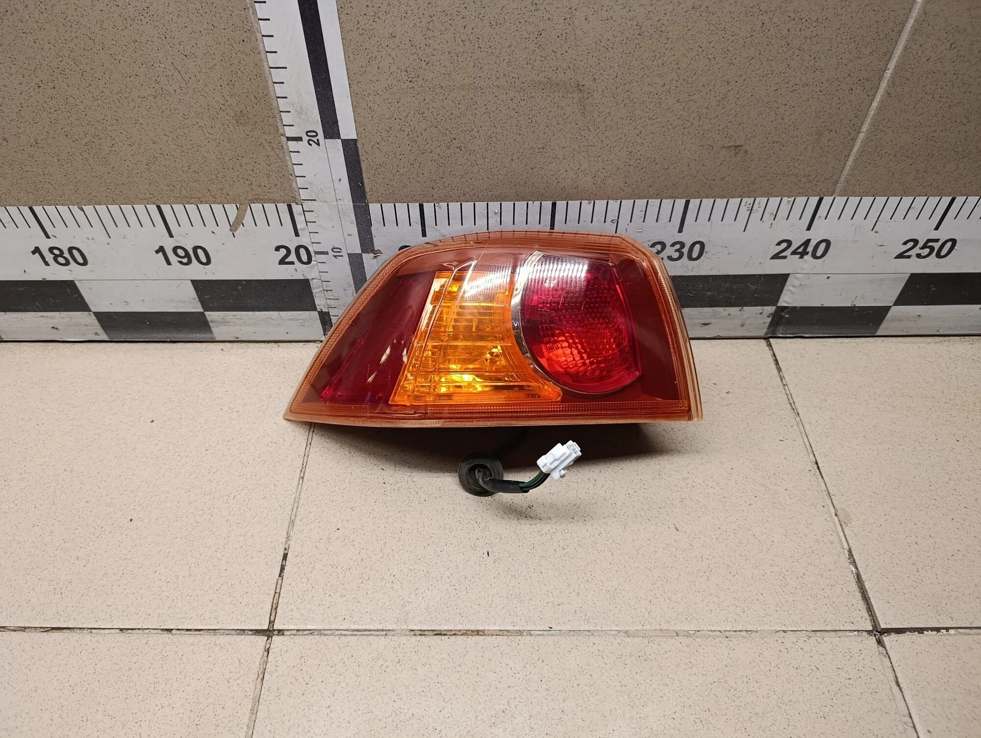 Фонарь задний наружный левый Lancer (CX,CY) 2007>