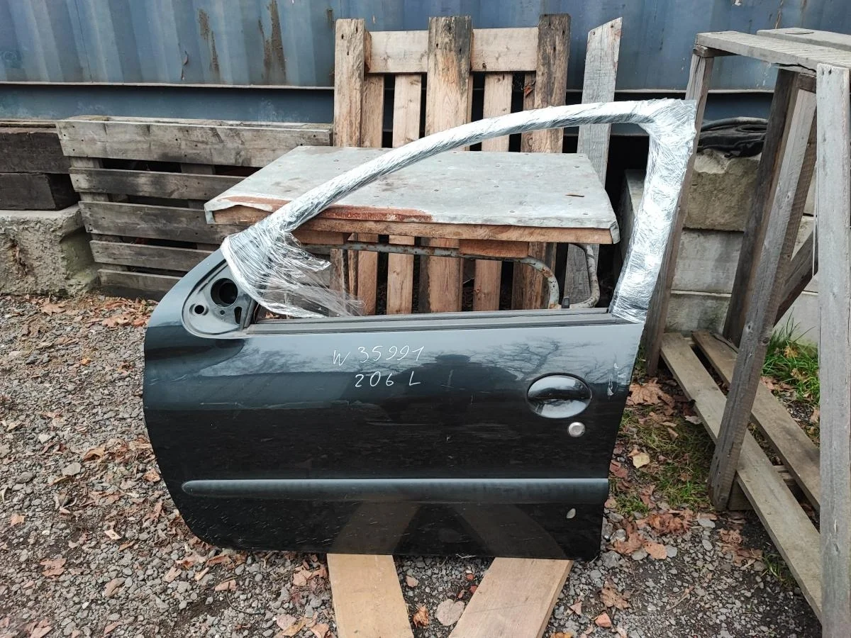 Дверь передняя левая