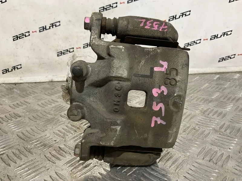 Суппорт тормозной Nissan Juke 2011 41011JN00A MR16DDT, передний левый