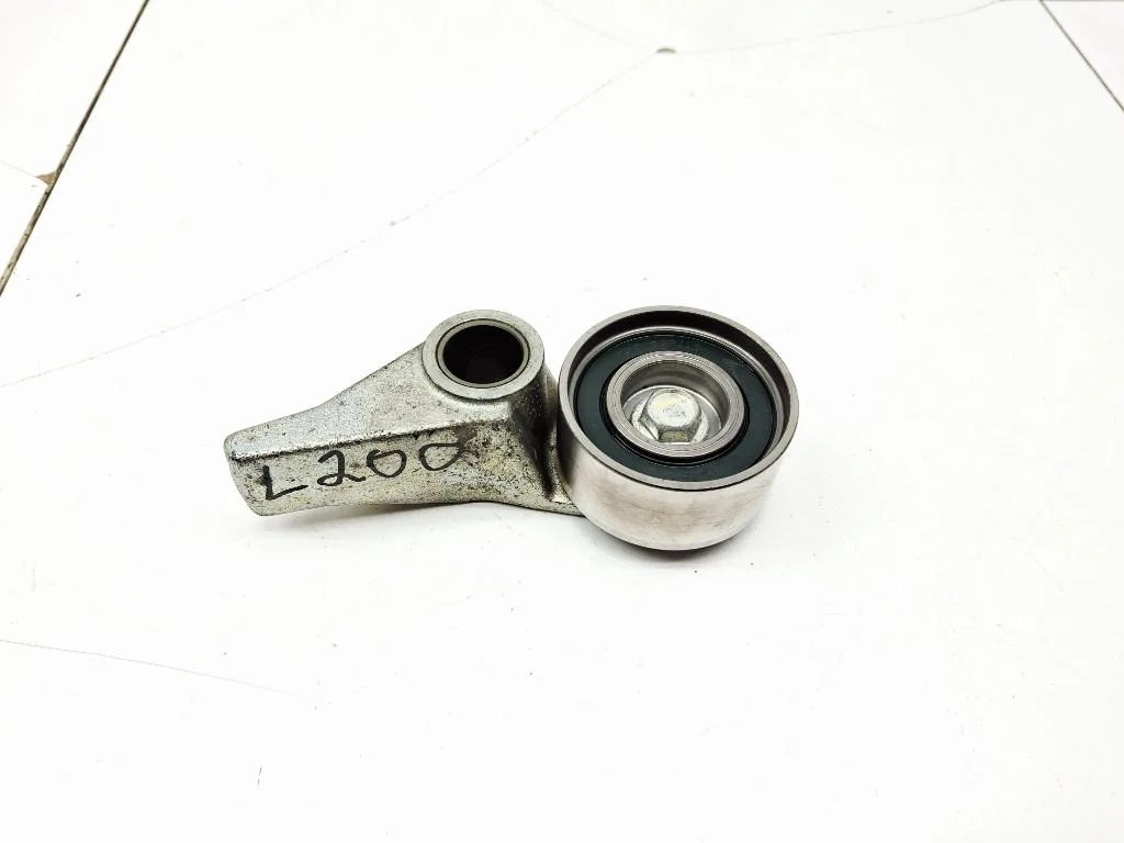 Ролик-натяжитель ремня грм Mitsubishi L200 2012 KA, KB