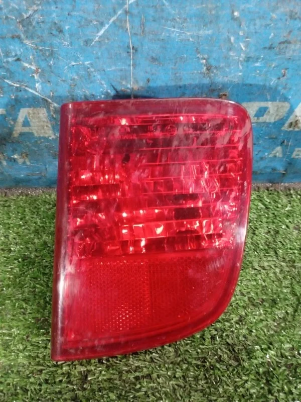 Фонарь в бампер задний правый Toyota Land Cruiser