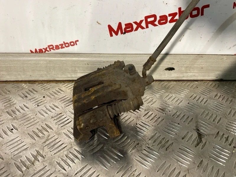 Суппорт Nissan Pathfinder 44011EB30A R51 YD25DDTI, задний левый