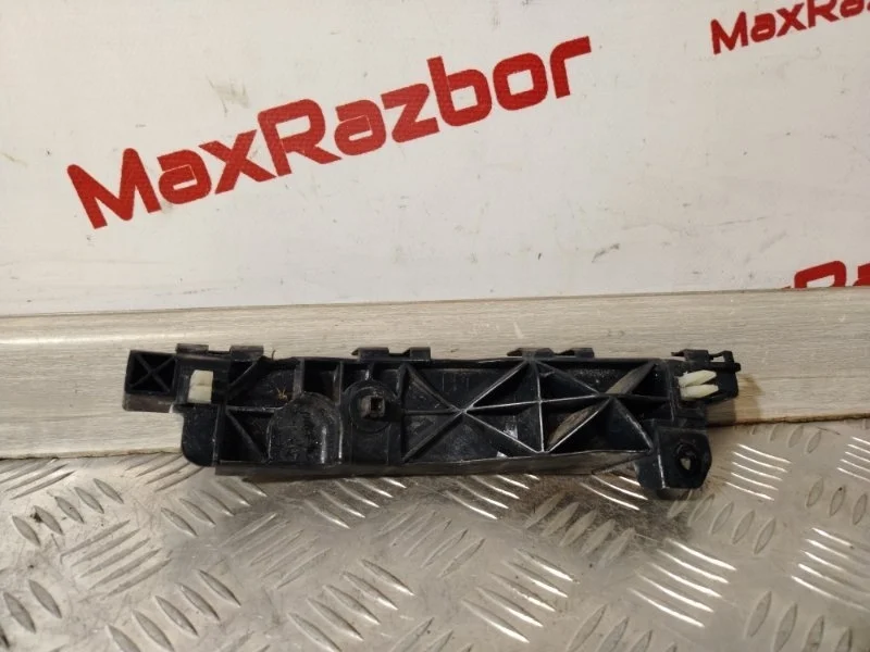 Кронштейн бампера Hyundai Ix35 865132Y000 LM, передний левый