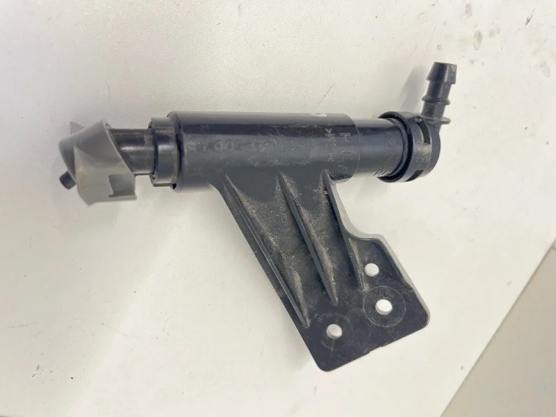 Форсунка омывателя фары Kia Sorento 2009-2012 986712P500 2, передняя левая