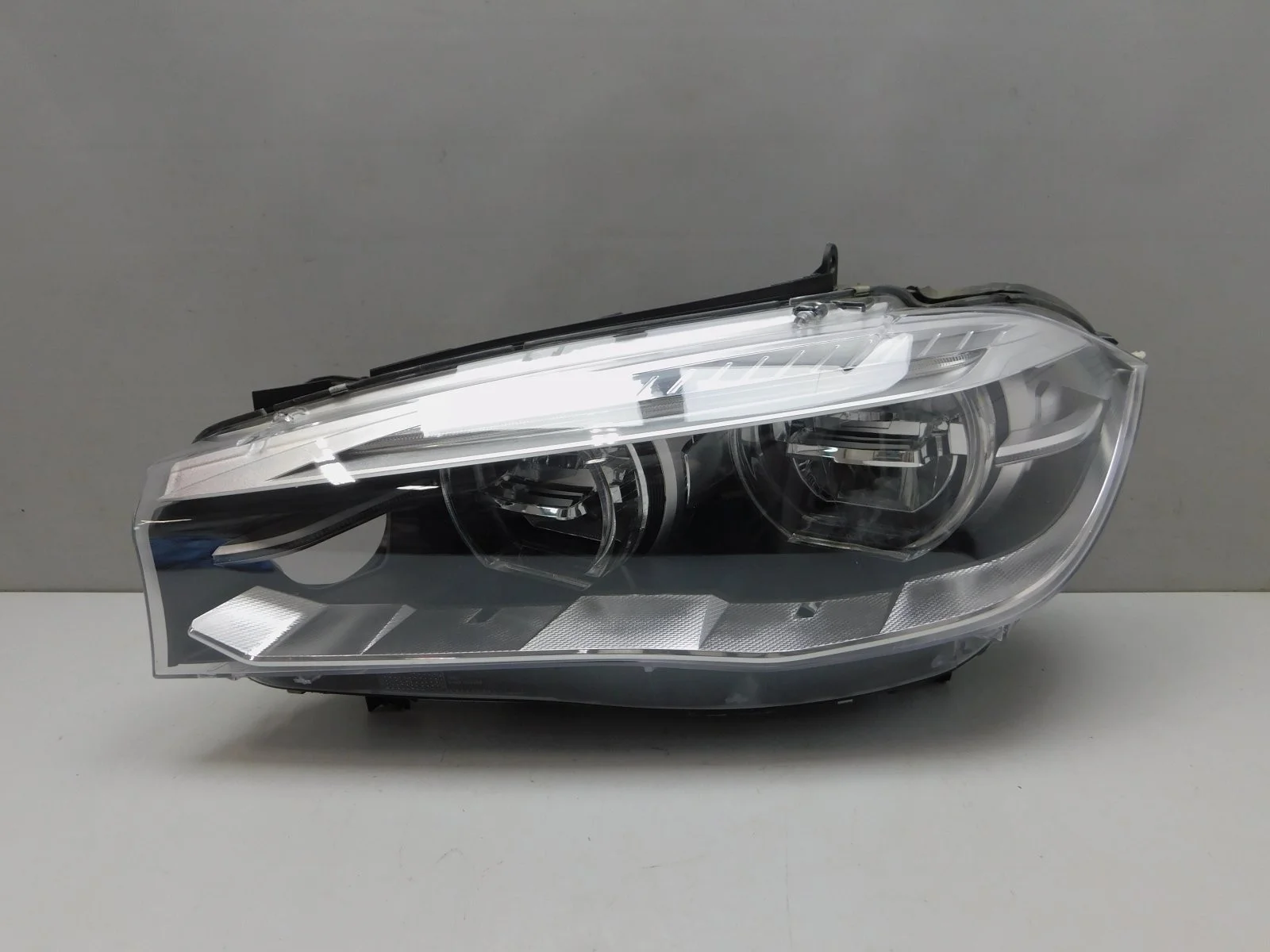 Фара левая BMW X5