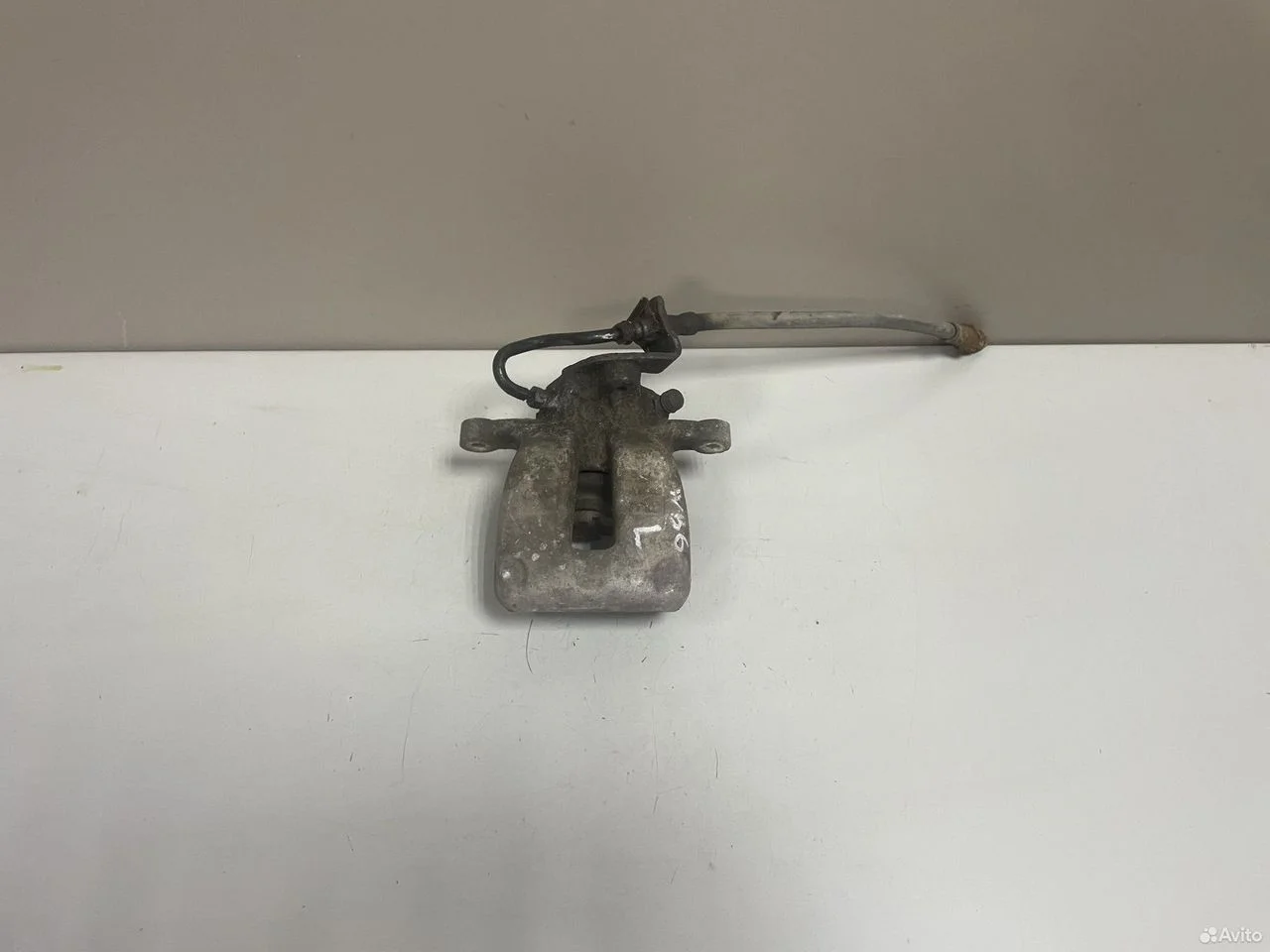 Суппорт задний левый volкswаgen passаt b6