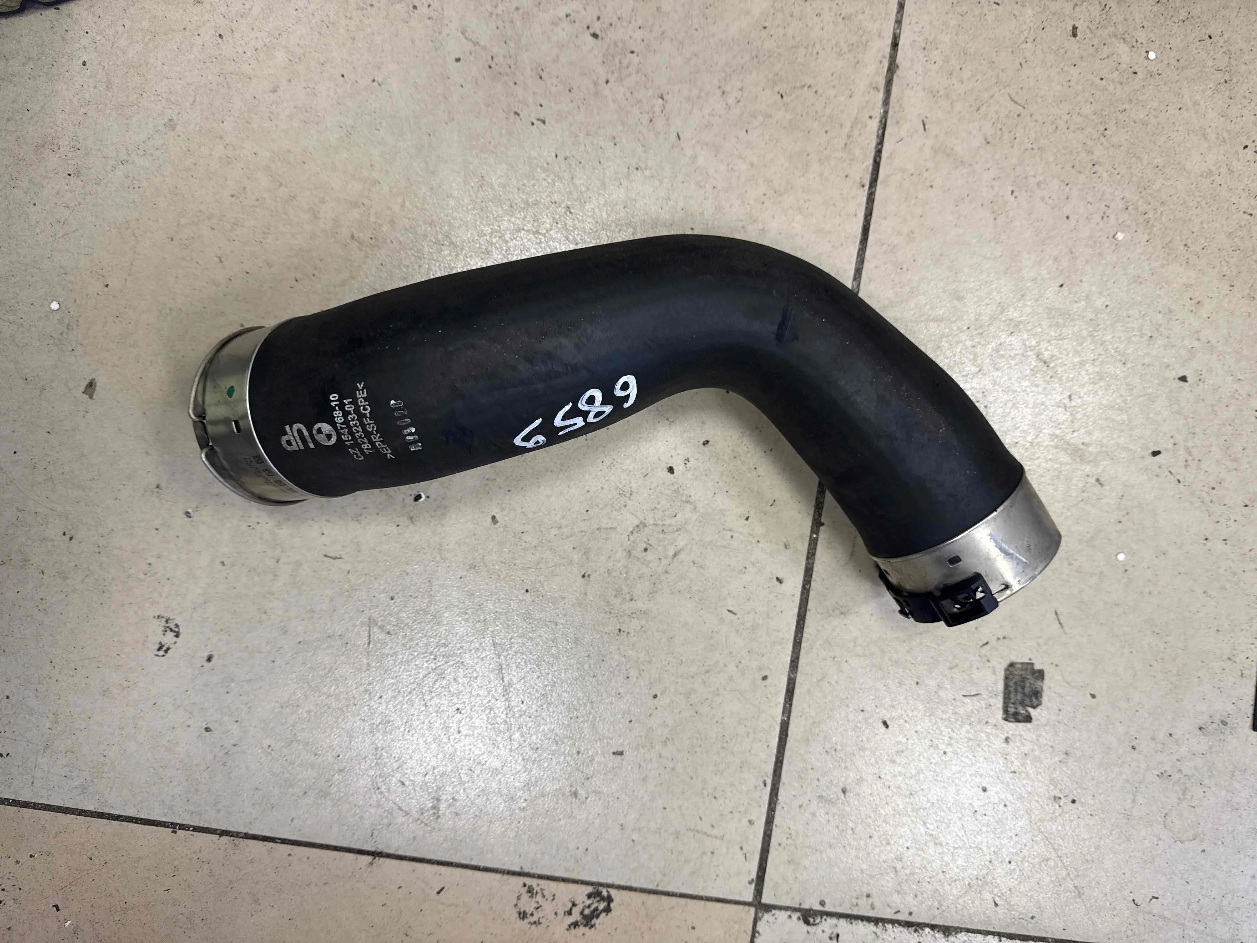 Патрубок интеркулера BMW F25 (2010—2014) 11617823233
 N57D30A