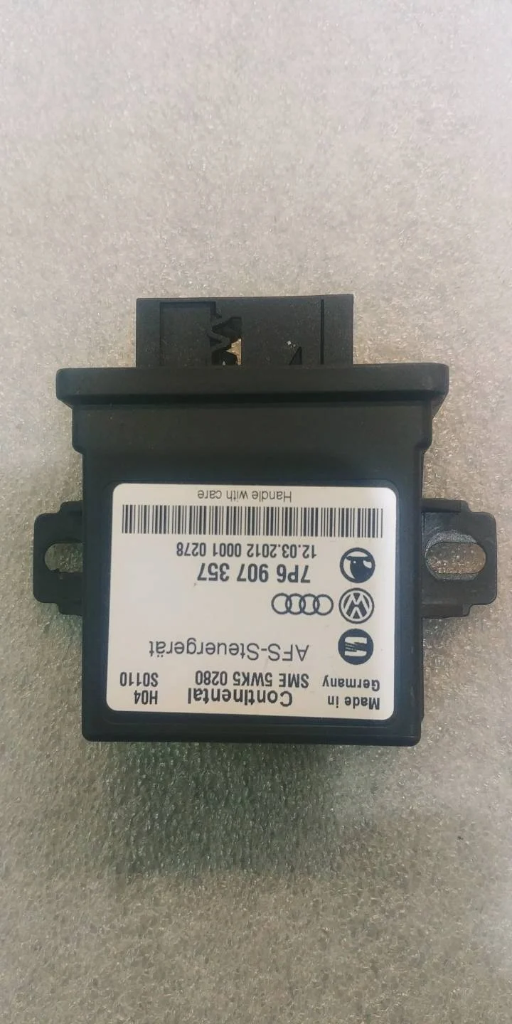 блок регулировки угла наклона фар Volkswagen Touareg 2 7P6 2012