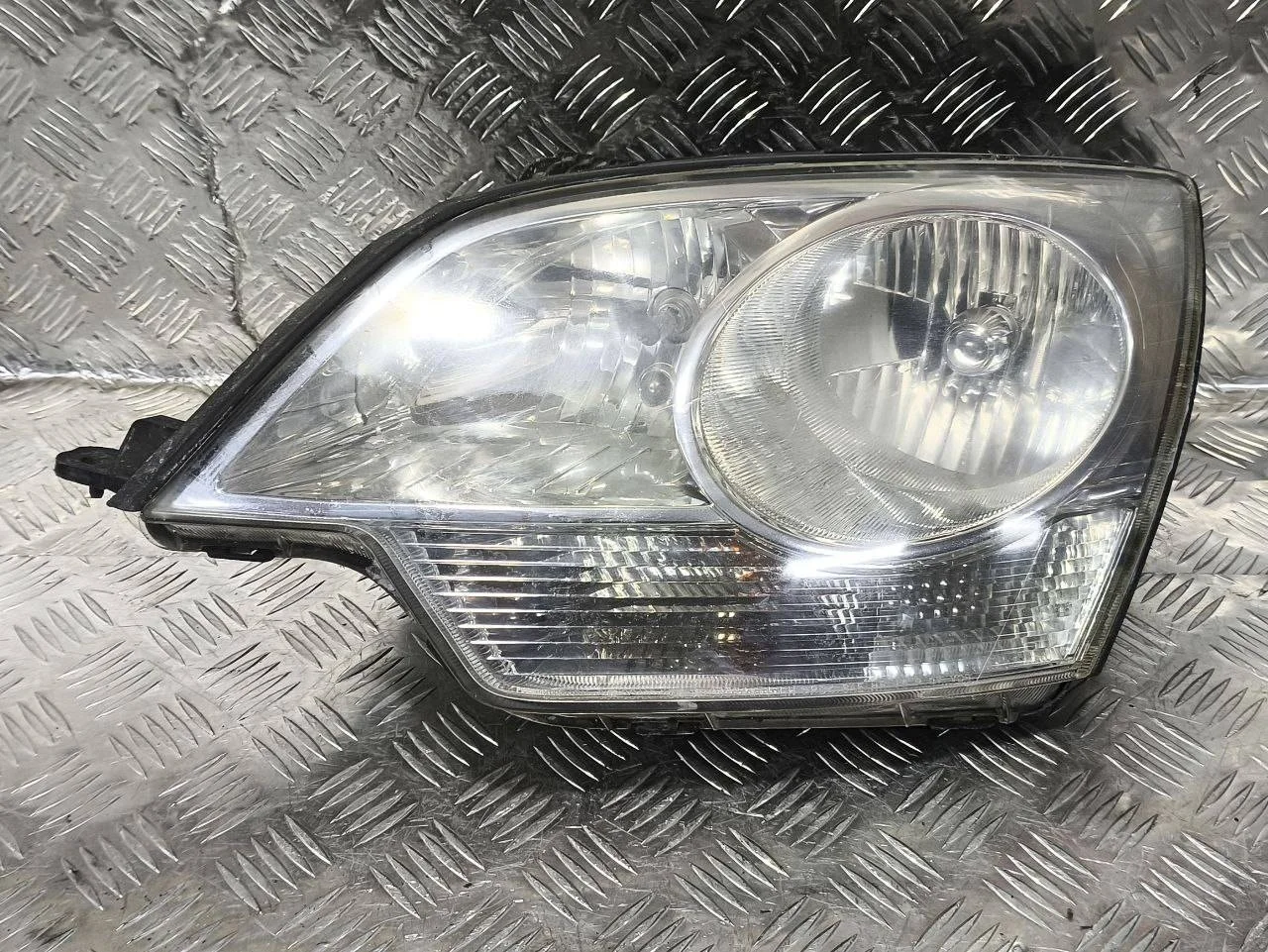 фара левая Opel Antara