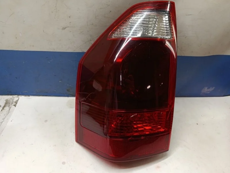 Фонарь Mitsubishi Pajero 2005 MN133765 V78W, задний левый