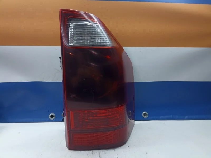 Фонарь Mitsubishi Pajero MN133766, задний правый