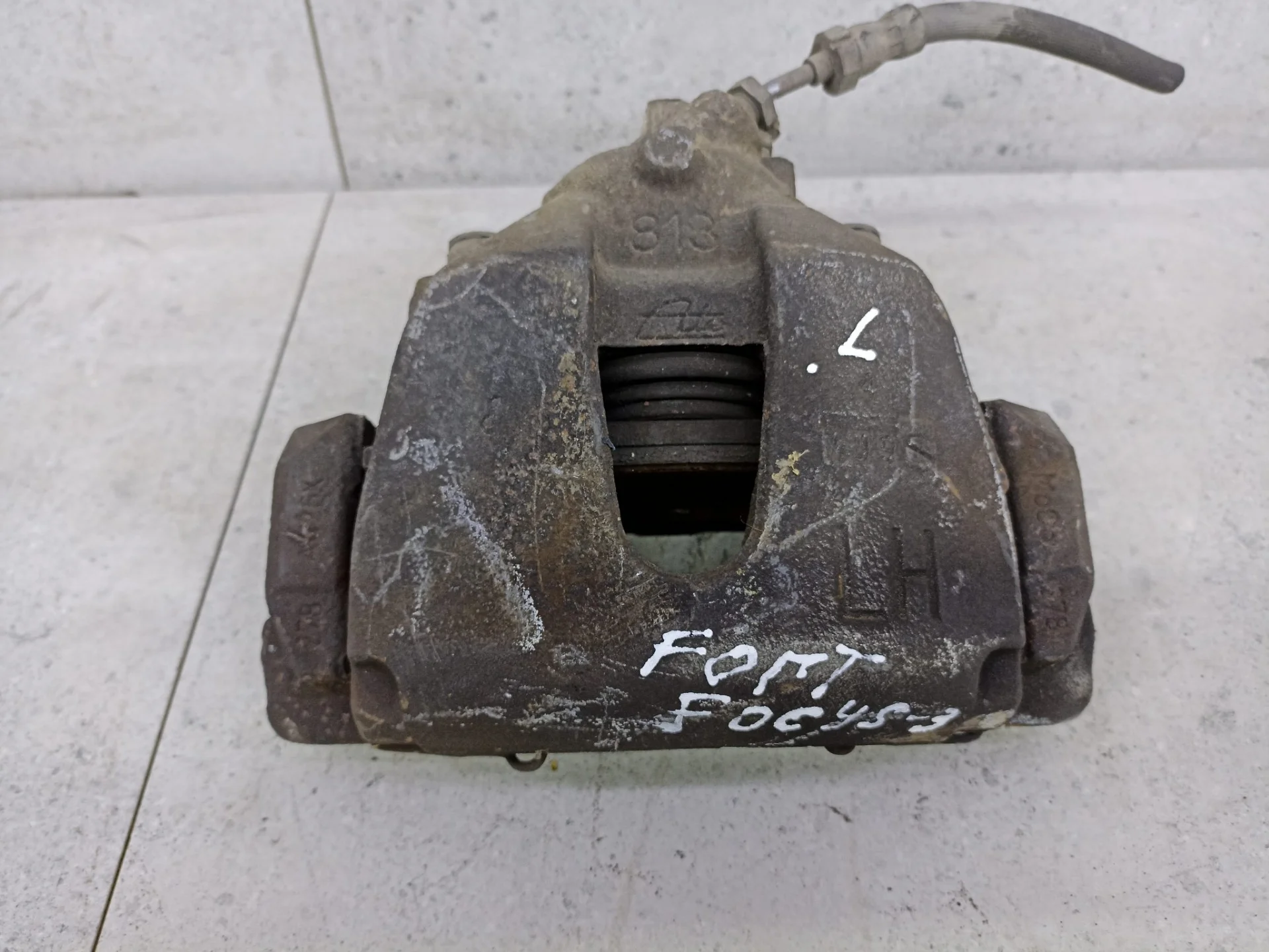 Суппорт тормозной передний левый Ford Focus 3 2012