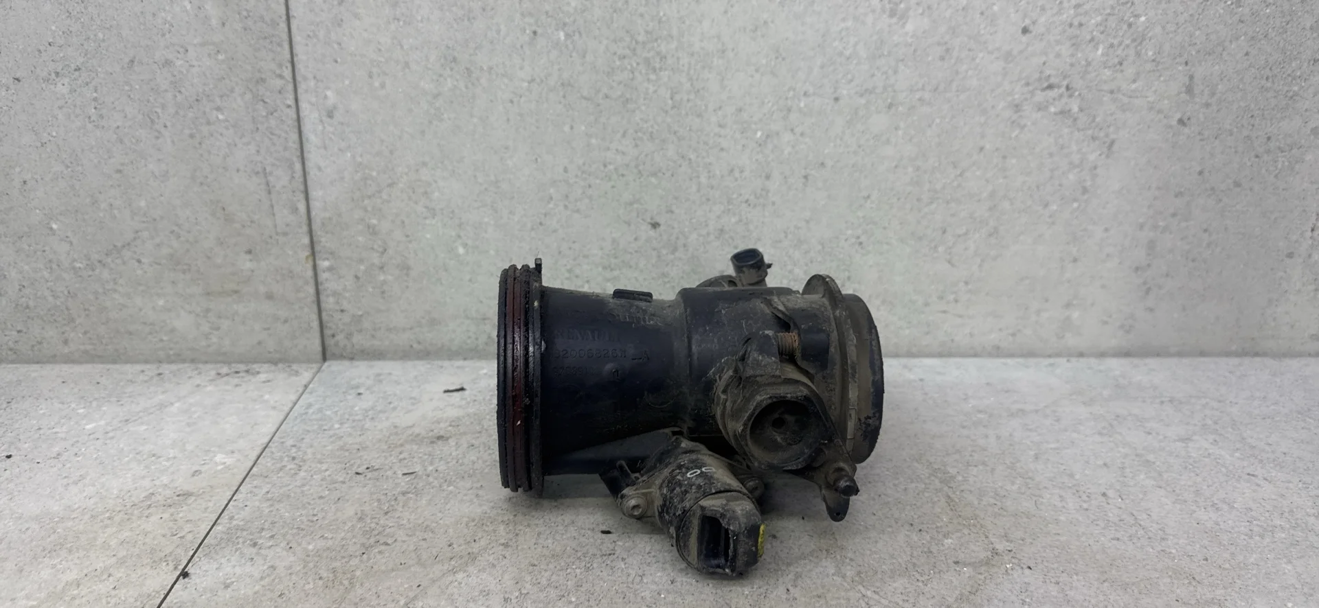 Дроссельная заслонка Renault Logan 2007 8200682611