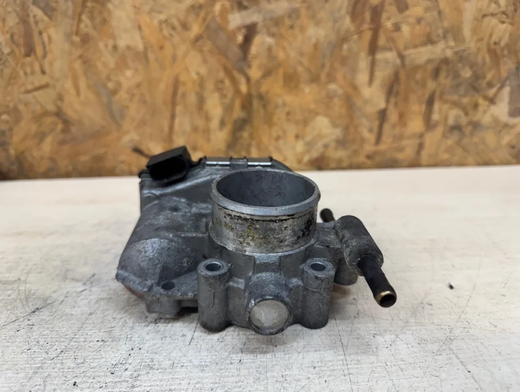 Дроссельная заслонка Opel Tigra Z14XEP