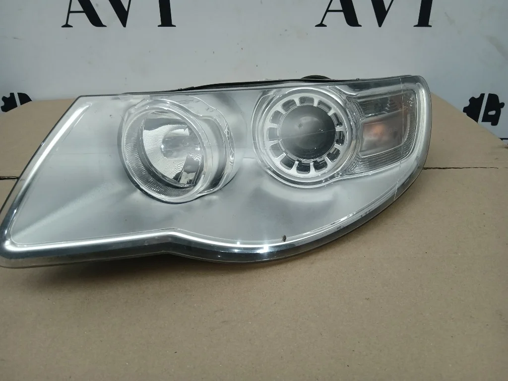 Фара галогеновая передняя левая Volkswagen Touareg