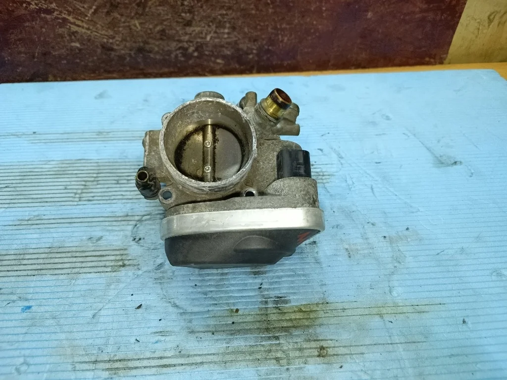 Дроссельная заслонка Opel Astra Z16XER