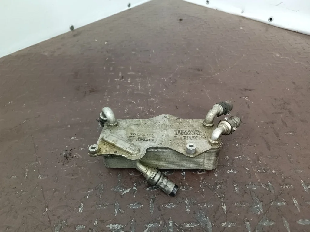 Теплообменник масляного фильтра Audi A4 CDN