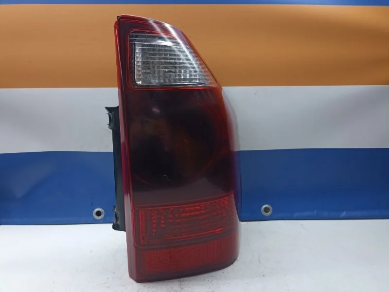 Фонарь Mitsubishi Pajero MN133766, задний правый