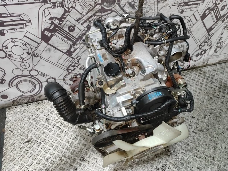 Двигатель Mitsubishi L200 Pajero Sport 1000C753 4D56U