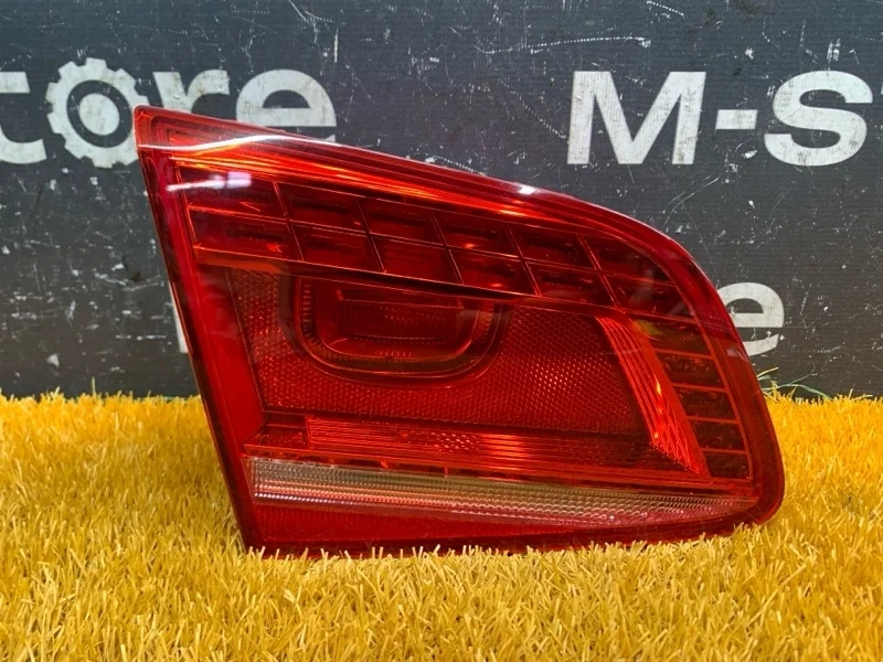 Фонарь крышки багажника Volkswagen Passat 2012 3AE945307D B7 CAX, левый