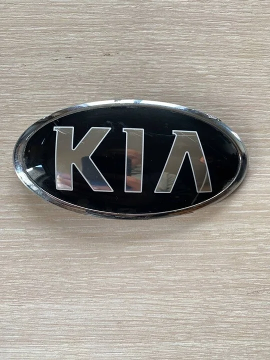 Эмблема на крышку багажника Kia Rio 4
