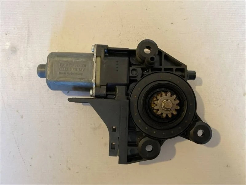 Моторчик стеклоподъемника передний правый Ford