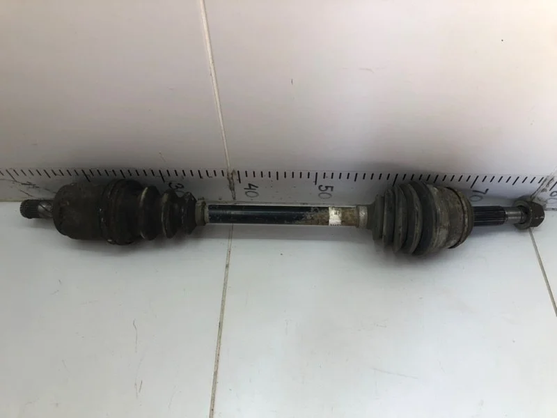 Полуось (привод) передний левый Nissan Almera