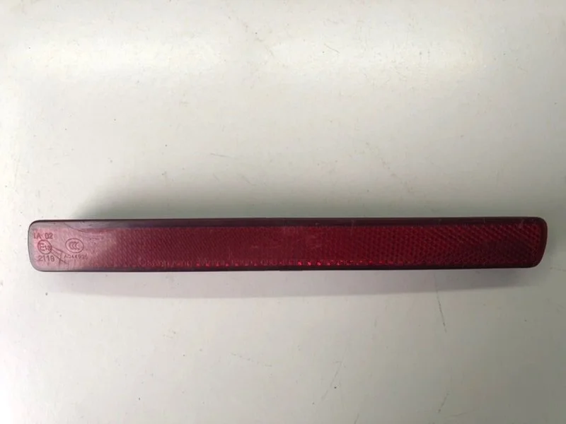 Отражатель в бампер задний левый SsangYong Rexton