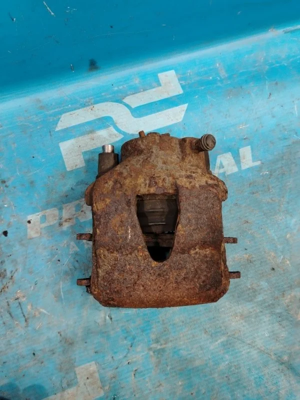 Суппорт тормозной передний правый Volkswagen Jetta