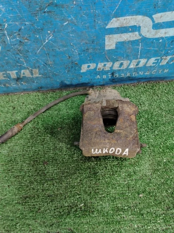 Суппорт тормозной передний правый Skoda Octavia A4