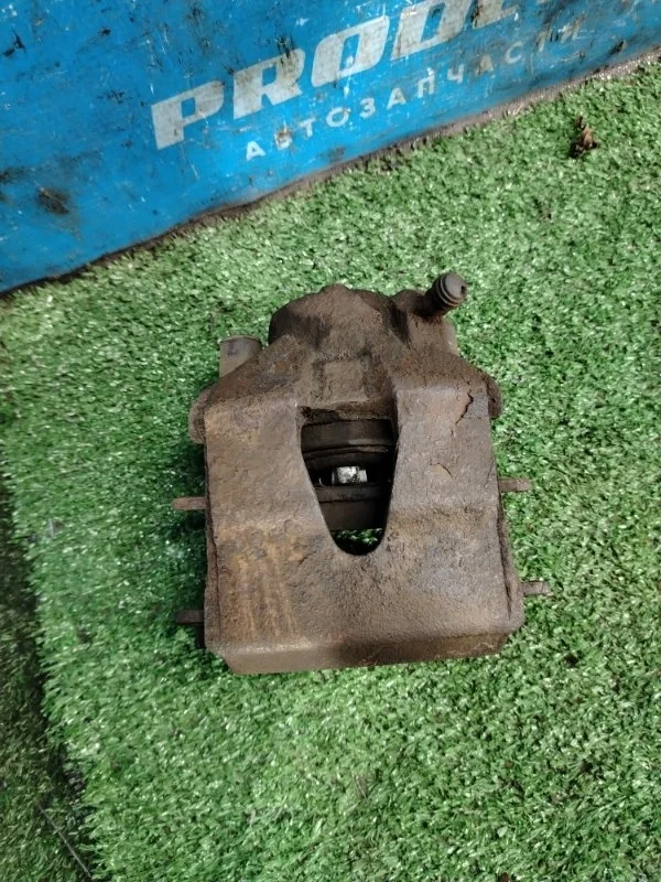 Суппорт тормозной передний левый Skoda Octavia A4