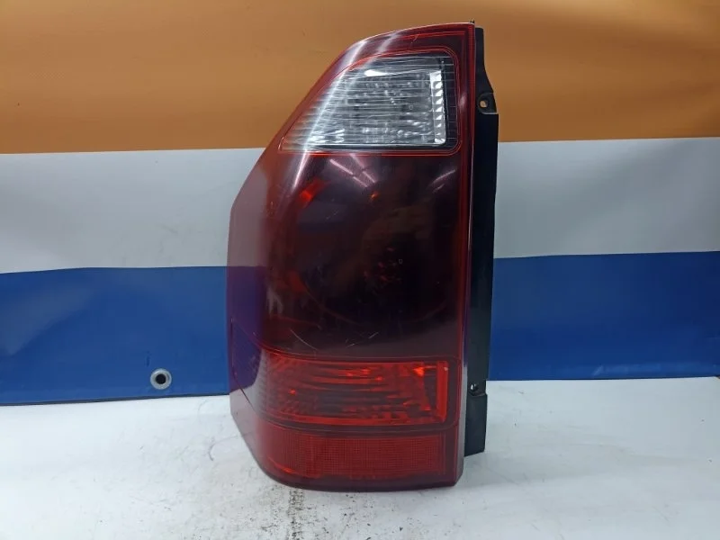 Фонарь Mitsubishi Pajero 2005 MN133765 V78W, задний левый