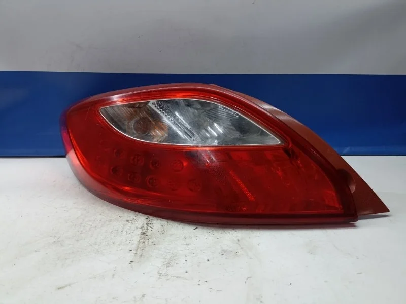 Фонарь Mazda Demio 2011 D65151160 DE, задний левый