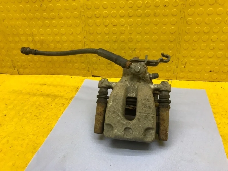 Суппорт тормозной Skoda Octavia 2018 5Q0615423A 5E3 CWV 594183, задний левый