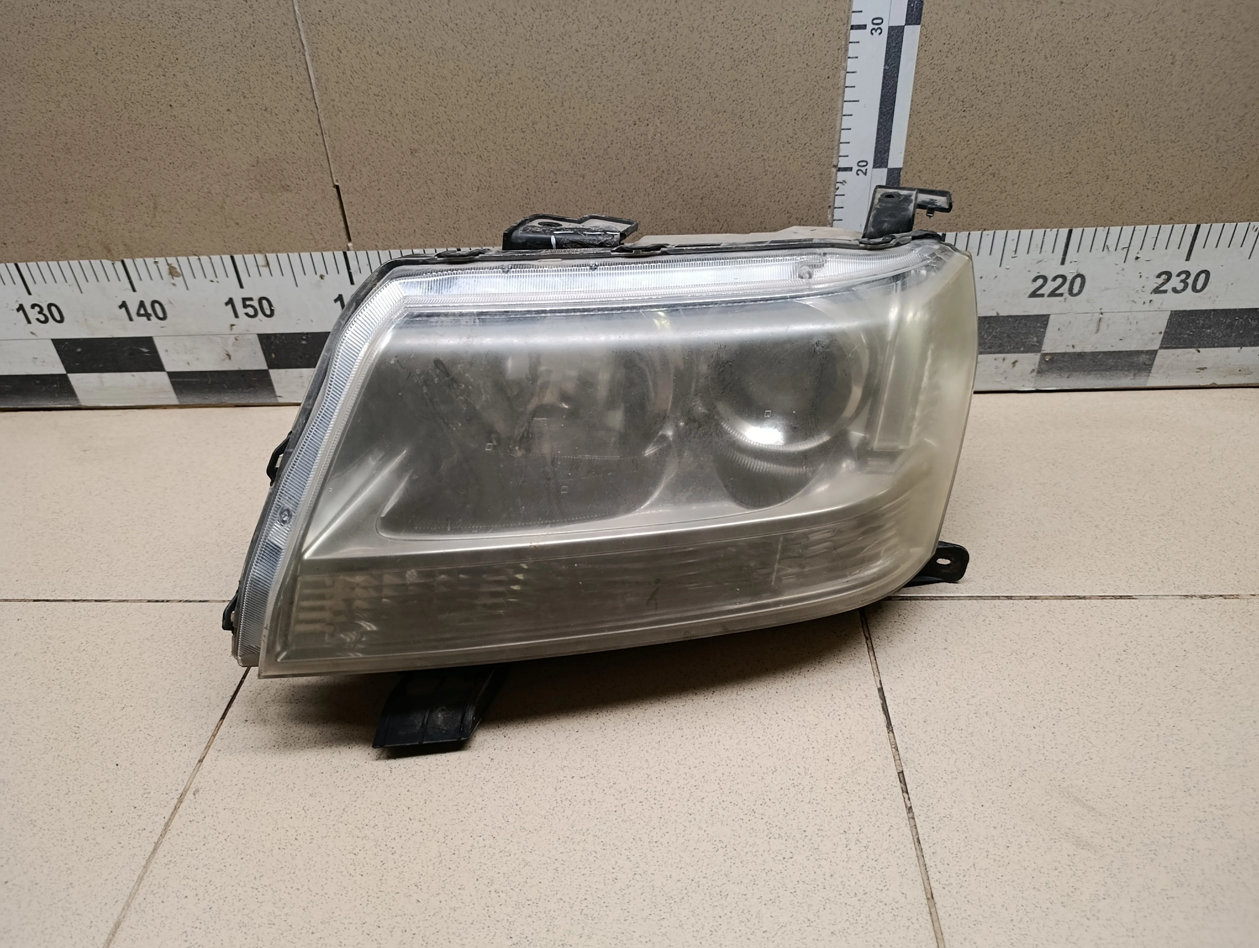 Фара левая Grand Vitara 2006-2015
