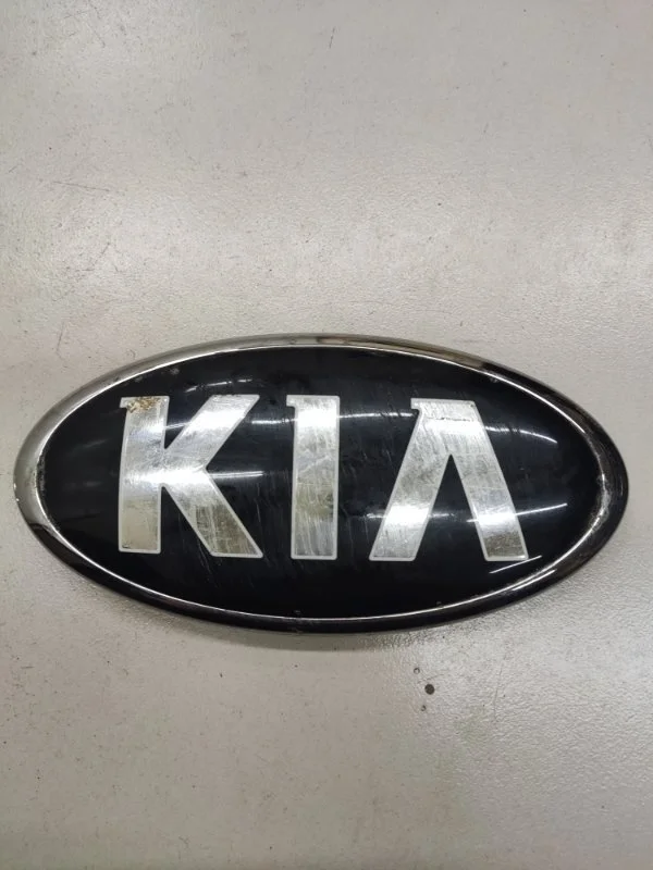 Эмблема на решетку радиатора Kia Venga