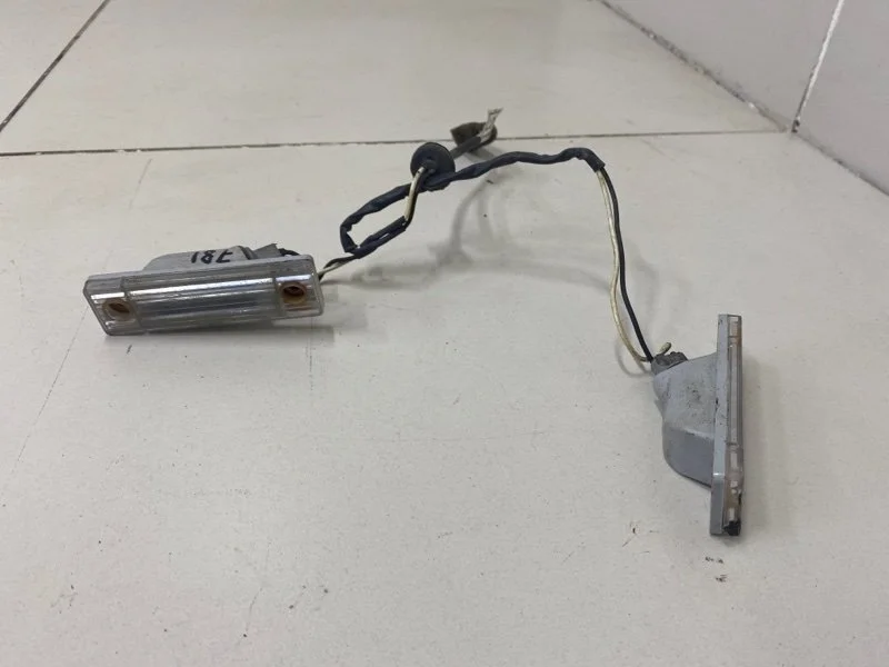 Фонари подсветки номера Chevrolet Aveo T255 B12D1