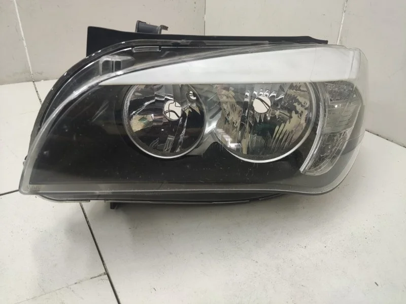 Фара левая BMW X1 E84 До 2012