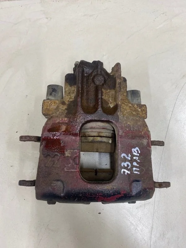 Суппорт тормозной передний правый Ford Focus 1