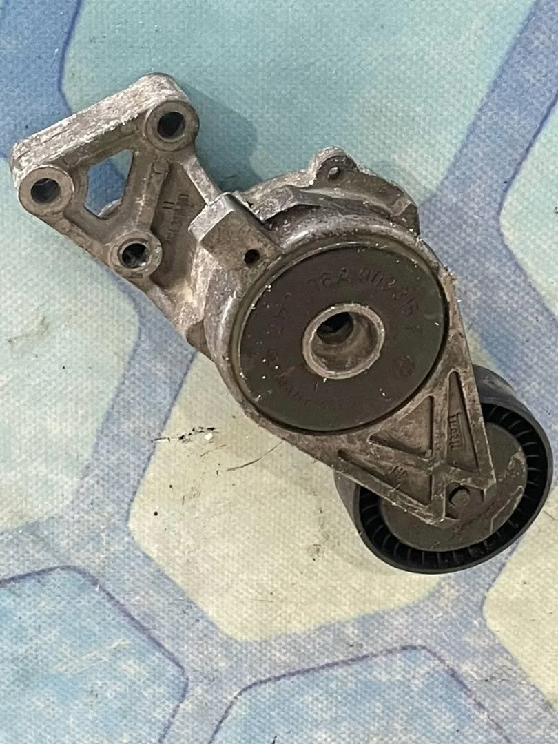 Ролик натяжителя ремня VW Passat 2007 B6