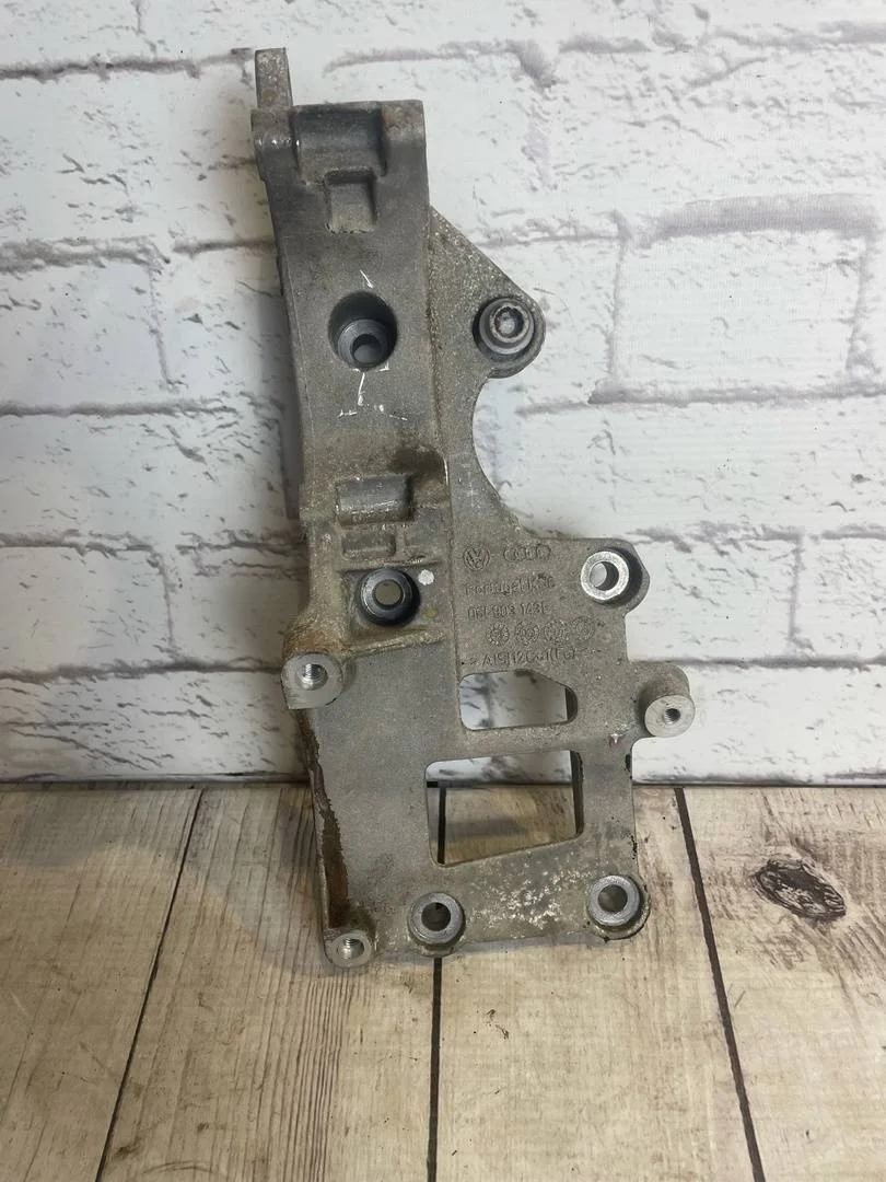 Кронштейн генератора VW Passat 2008 B6