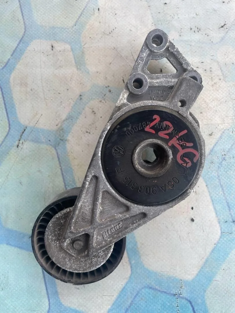 Ролик натяжителя ремня VW Touran 2008