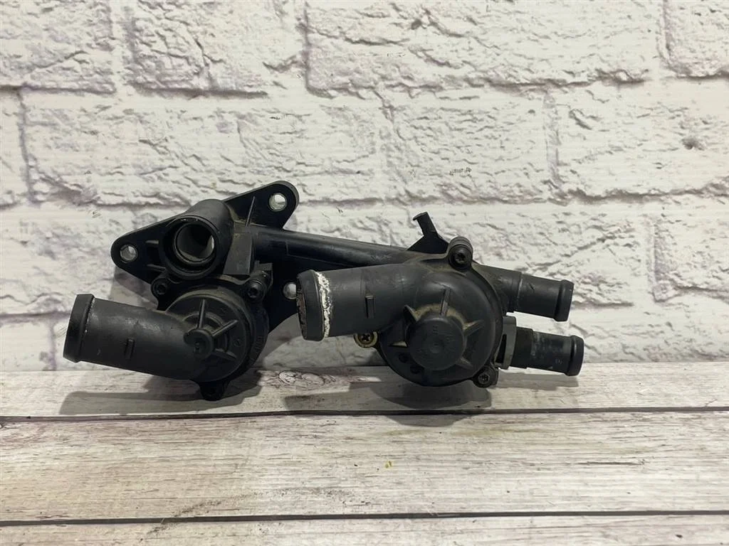 Корпус термостата Skoda Fabia 2 2010